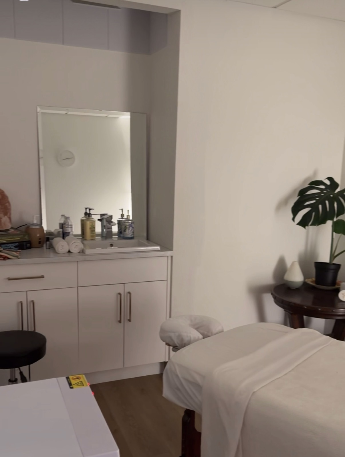 A calm, prepared massage treatment room